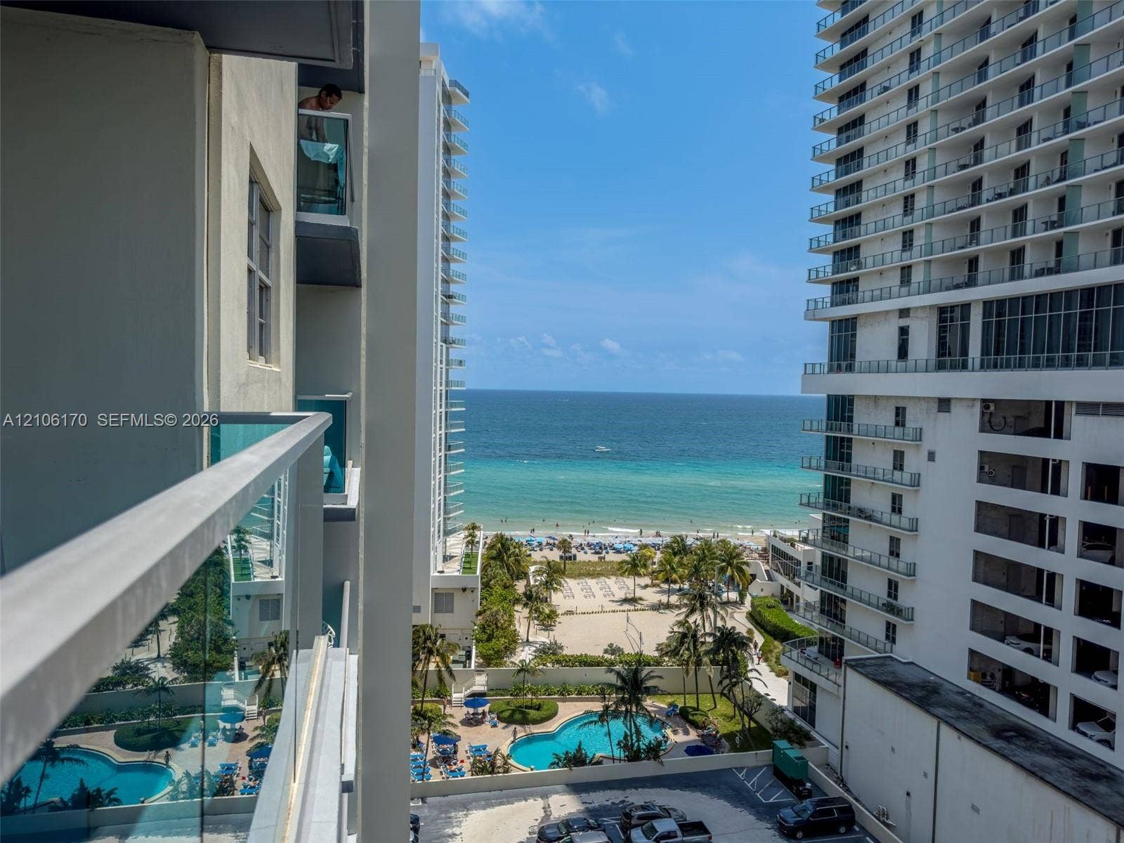 4001 S Ocean Drive, #12B, Hollywood, Hollywood, FL 33019 Private balcony with glass panel railing overlooking the ocean and beach shoreline