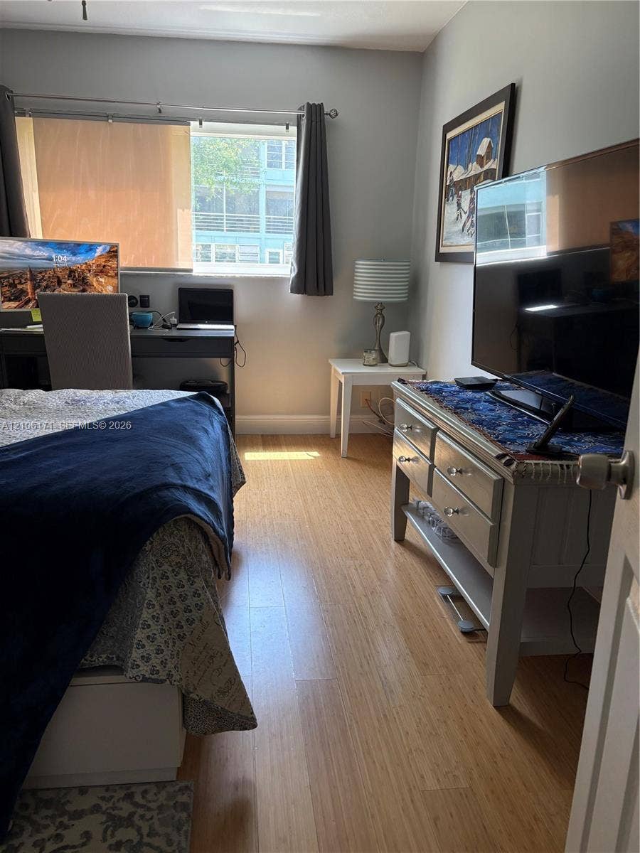 Wood-finish flooring and a single-pane window