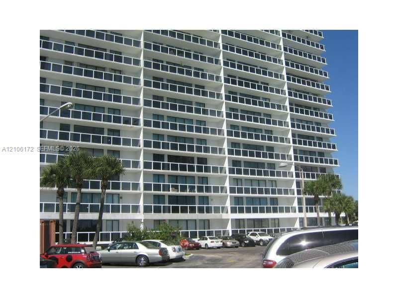 20515 E Country Club Drive, #246, Aventura, Aventura, FL 33180 High-rise concrete exterior featuring private balconies and expansive glass sliders across multiple levels