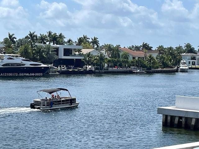 20515 E Country Club Drive, #246, Aventura, Aventura, FL 33180 Waterfront property featuring a concrete bulkhead and dock