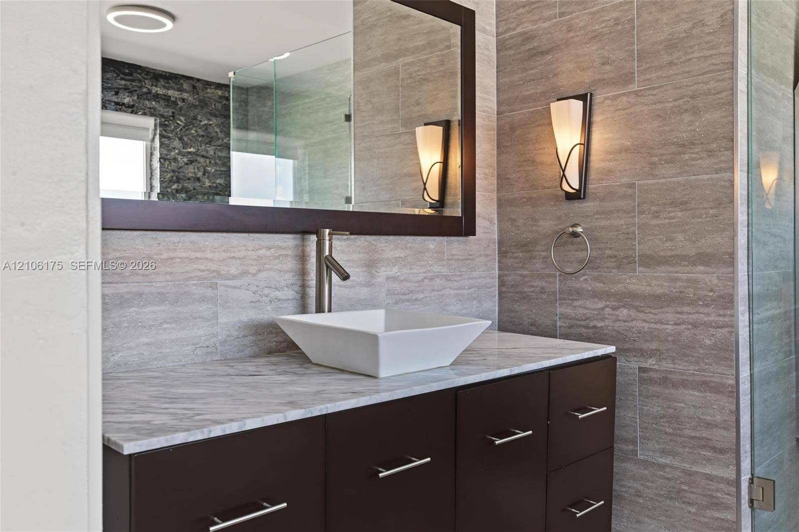 6905 W 2nd Way, #1, Hialeah, Hialeah, FL 33014 Custom vanity featuring a neutral stone countertop, vessel sink, and rectangular mirror