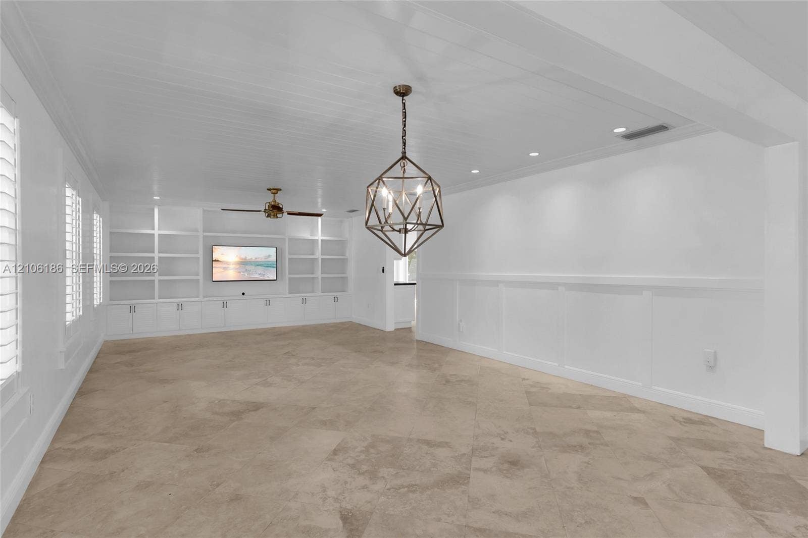 8600 SW 145th Street, Palmetto Bay, FL 33158 Virtually staged Living room & dining area