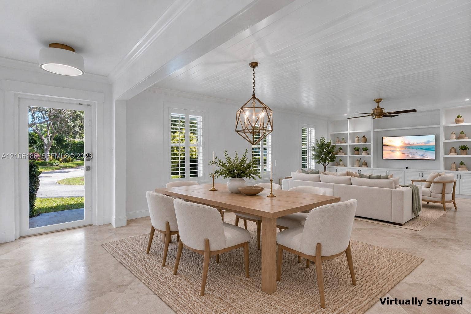 8600 SW 145th Street, Palmetto Bay, FL 33158 Virtually staged Living room & dining area