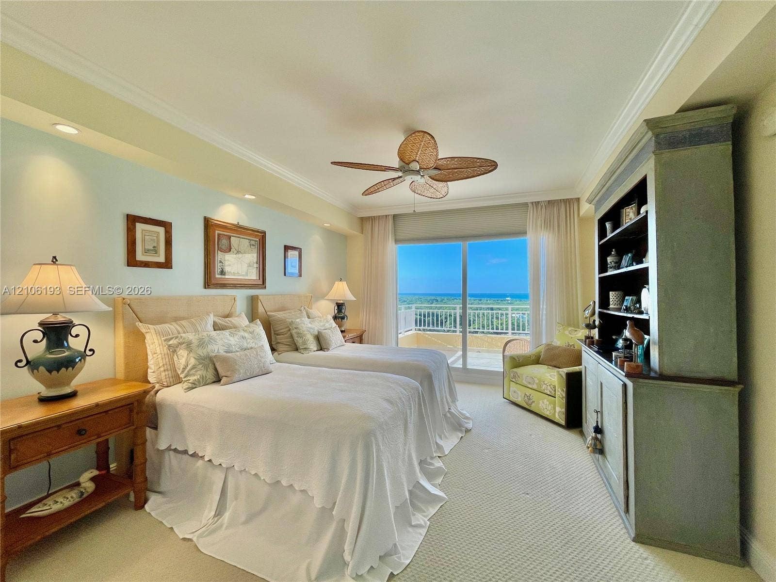 799 Crandon Boulevard, #1203, Key Biscayne, Key Biscayne, FL 33149 Bedroom featuring crown molding, recessed lighting, a ceiling fan with woven blades, built-in cabinetry, and sliding glass doors with direct access to a balcony