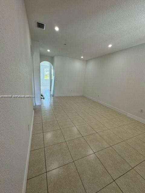 17660 NW 73rd Avenue, #202-3, Hialeah, Hialeah, FL 33015 Spacious interior room featuring neutral wall finishes, recessed ceiling lighting, and tile flooring throughout