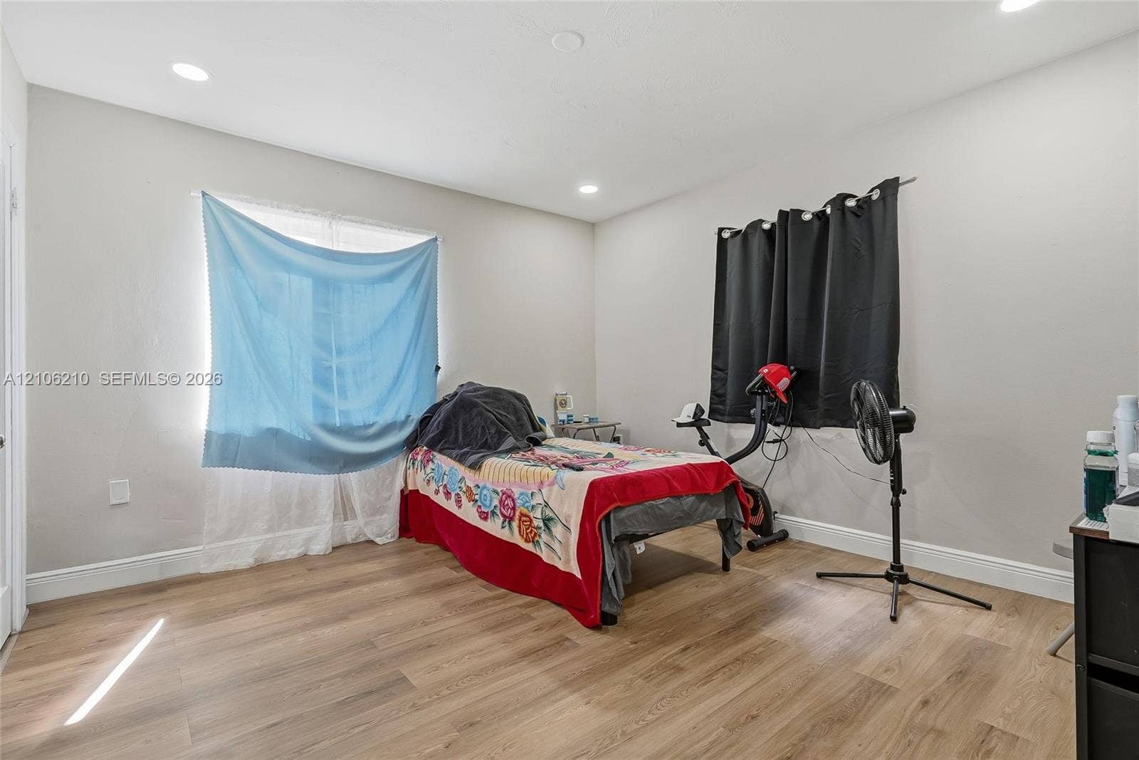 1111 S 7th Street, Fort Pierce, FL 34950 Neutral interior space featuring wood-finish flooring and recessed lighting