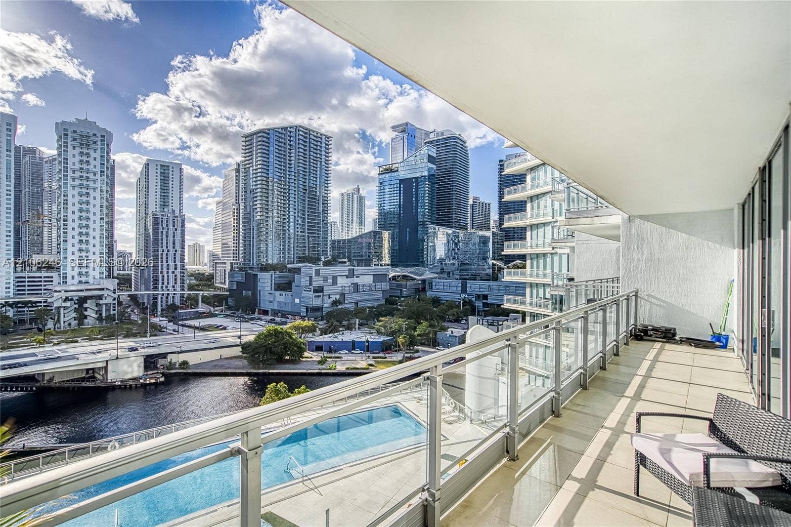 92 SW 3rd Street, #1511, Miami, Miami, FL 33130 Covered balcony featuring tile flooring and a glass-paneled railing