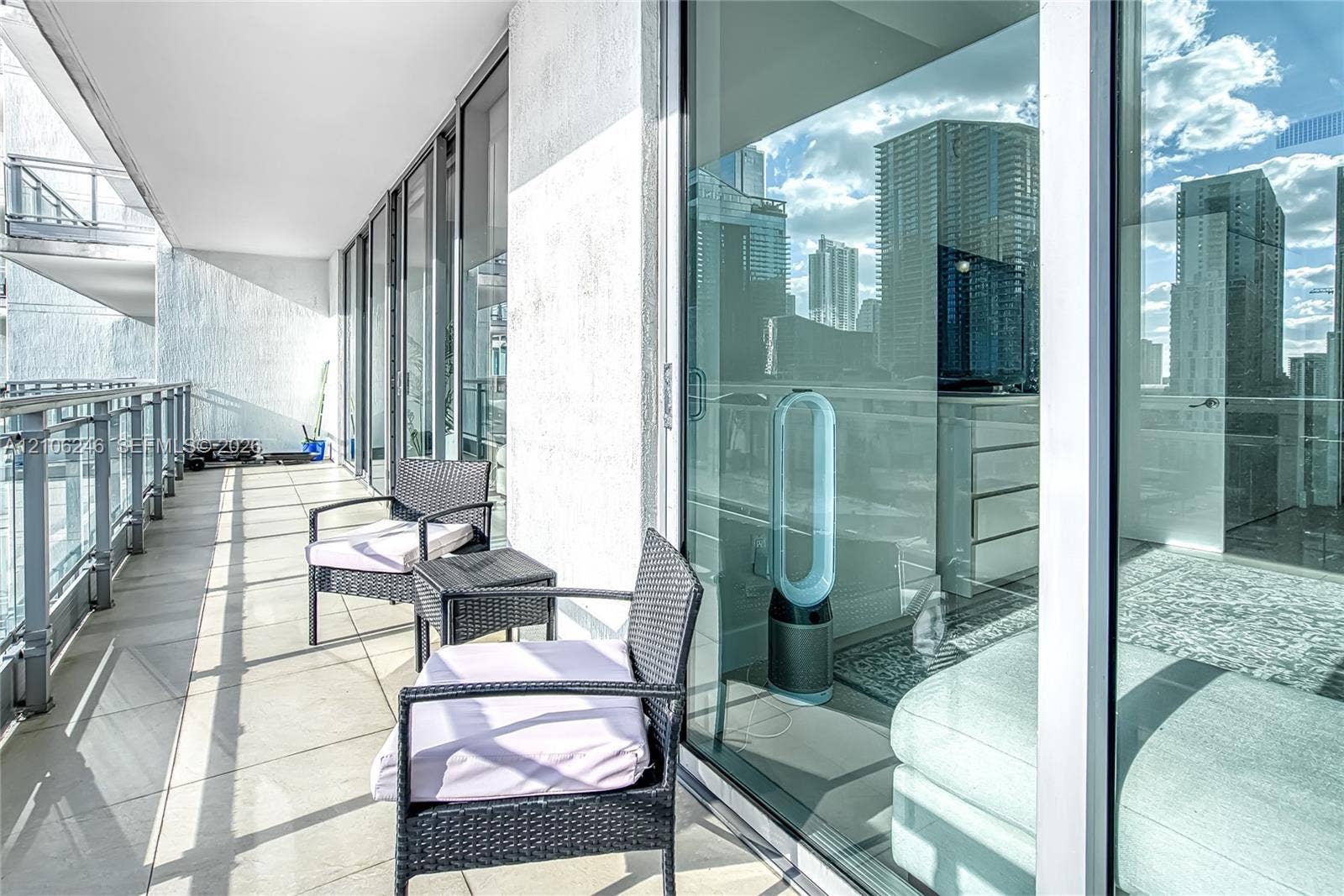 92 SW 3rd Street, #1511, Miami, Miami, FL 33130 Covered balcony featuring tile flooring and a glass-paneled railing