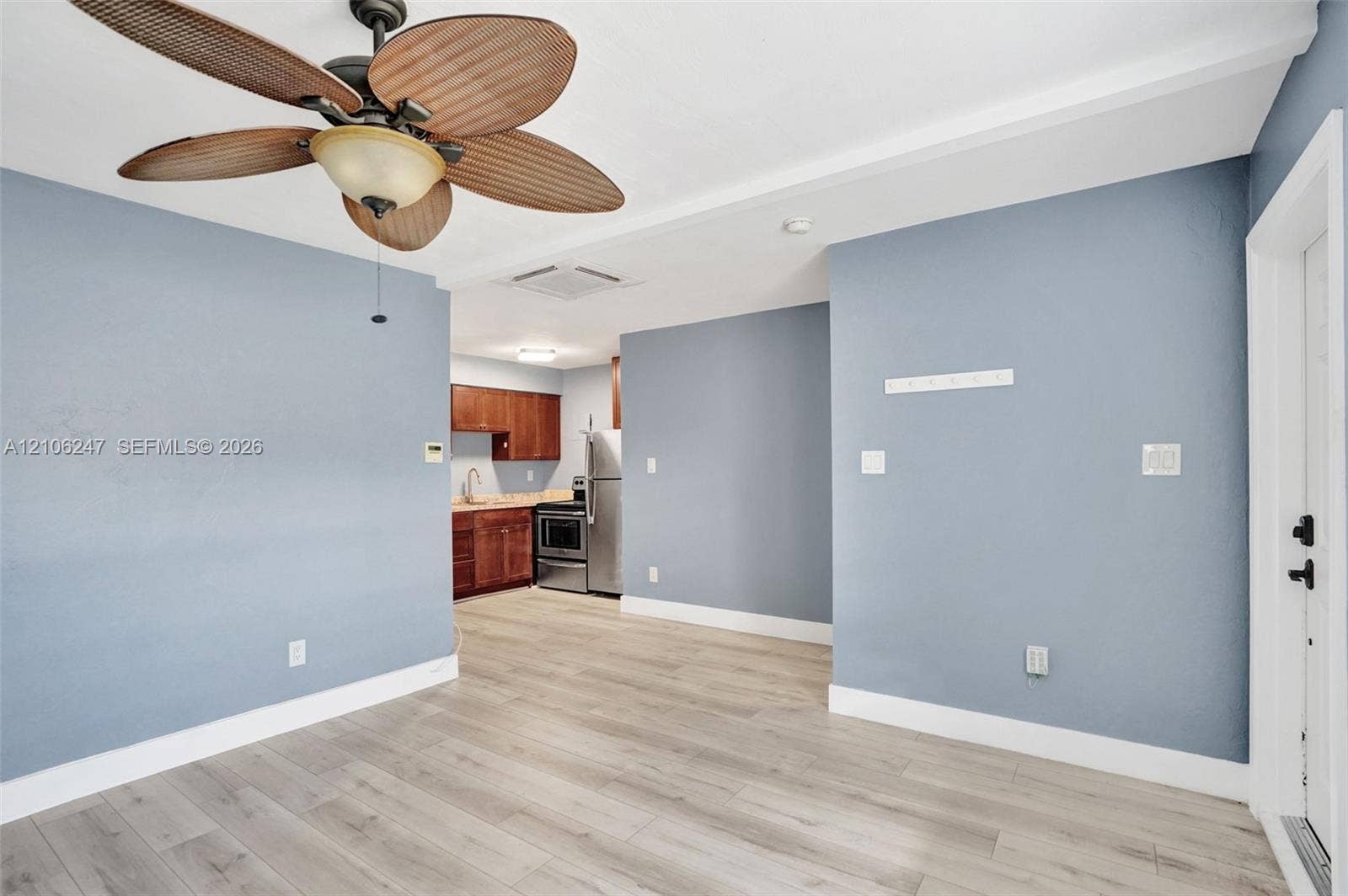 1037 N Victoria Park Road, #2, Fort Lauderdale, Fort Lauderdale, FL 33304 Wood-finish flooring, ceiling fan with integrated lighting, stainless steel kitchen appliances, and wooden cabinetry