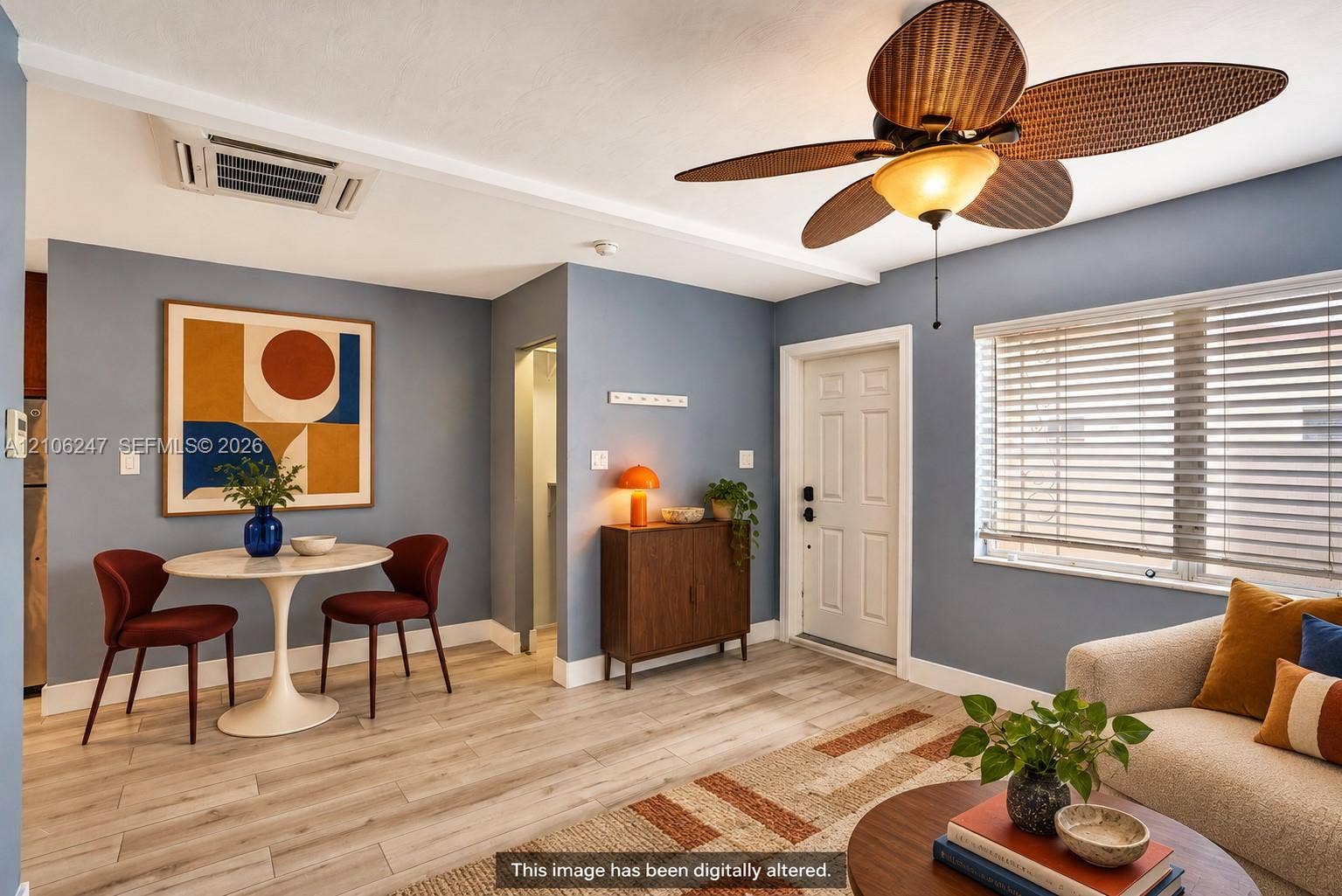 1037 N Victoria Park Road, #2, Fort Lauderdale, Fort Lauderdale, FL 33304 Wood-finish flooring, recessed ceiling-mounted HVAC unit, and palm-leaf style ceiling fan with central lighting