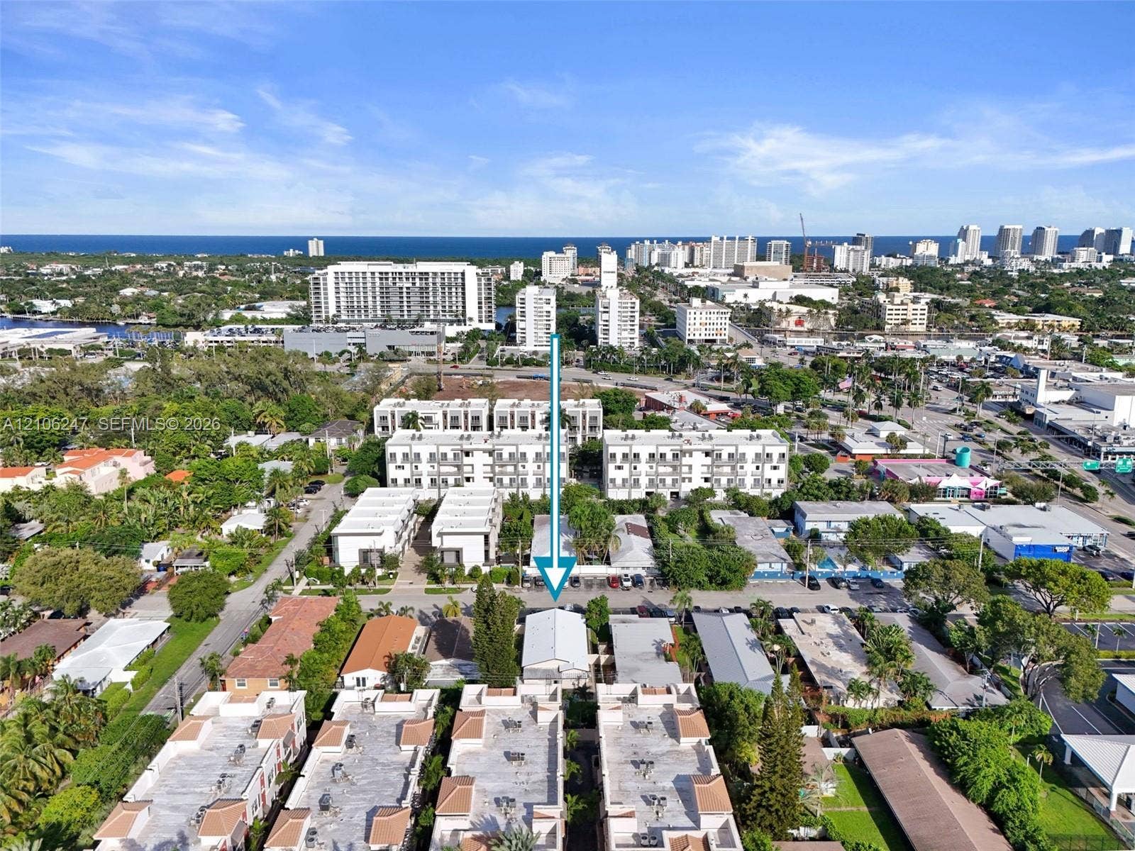 1037 N Victoria Park Road, #2, Fort Lauderdale, Fort Lauderdale, FL 33304 Aerial perspective of a detached residential structure featuring a pitched roof and a rectangular footprint situated within a coastal metropolitan landscape