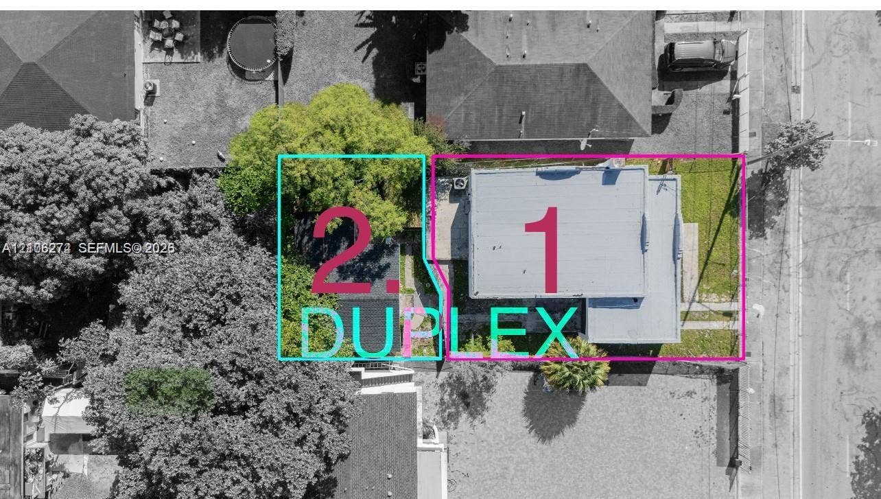 1601 NW 50th Street, Miami, FL 33142 Aerial perspective of the property featuring a rectangular structure, dedicated off-street parking areas, and mature landscaping