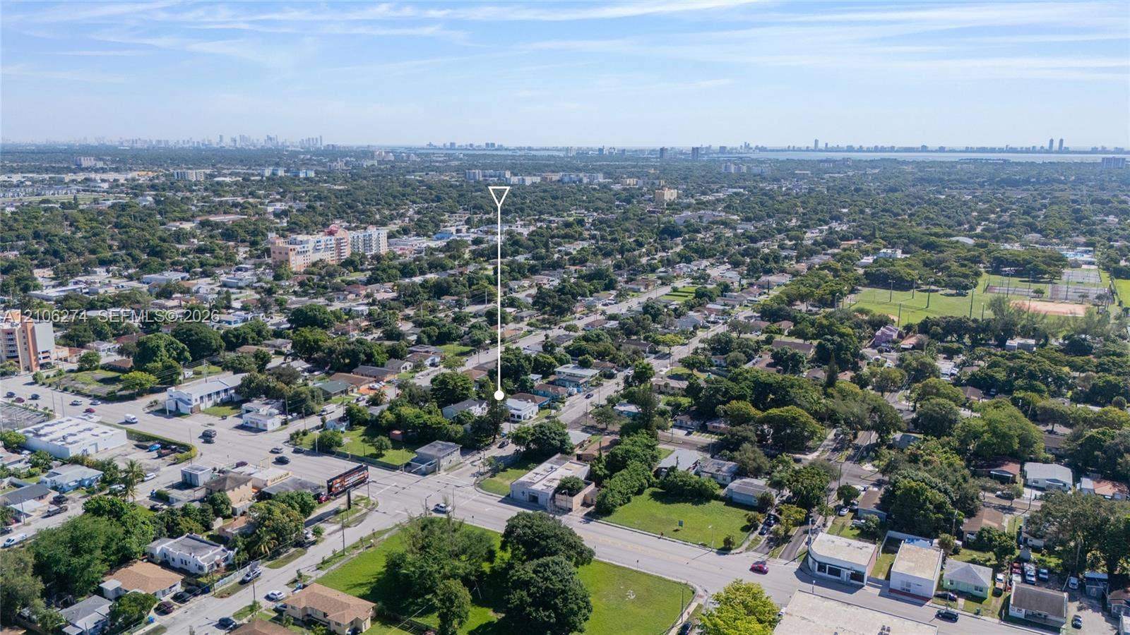 1601 NW 50th Street, Miami, FL 33142 Aerial perspective of the property location, characterized by mature tree canopy coverage and proximity to local thoroughfares