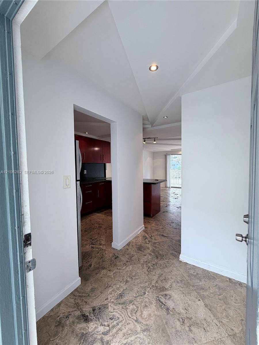 665 NE 83rd Terrace, #210, Miami, Miami, FL 33138 Entryway featuring stone-tile flooring, recessed ceiling lighting, and a neutral color palette