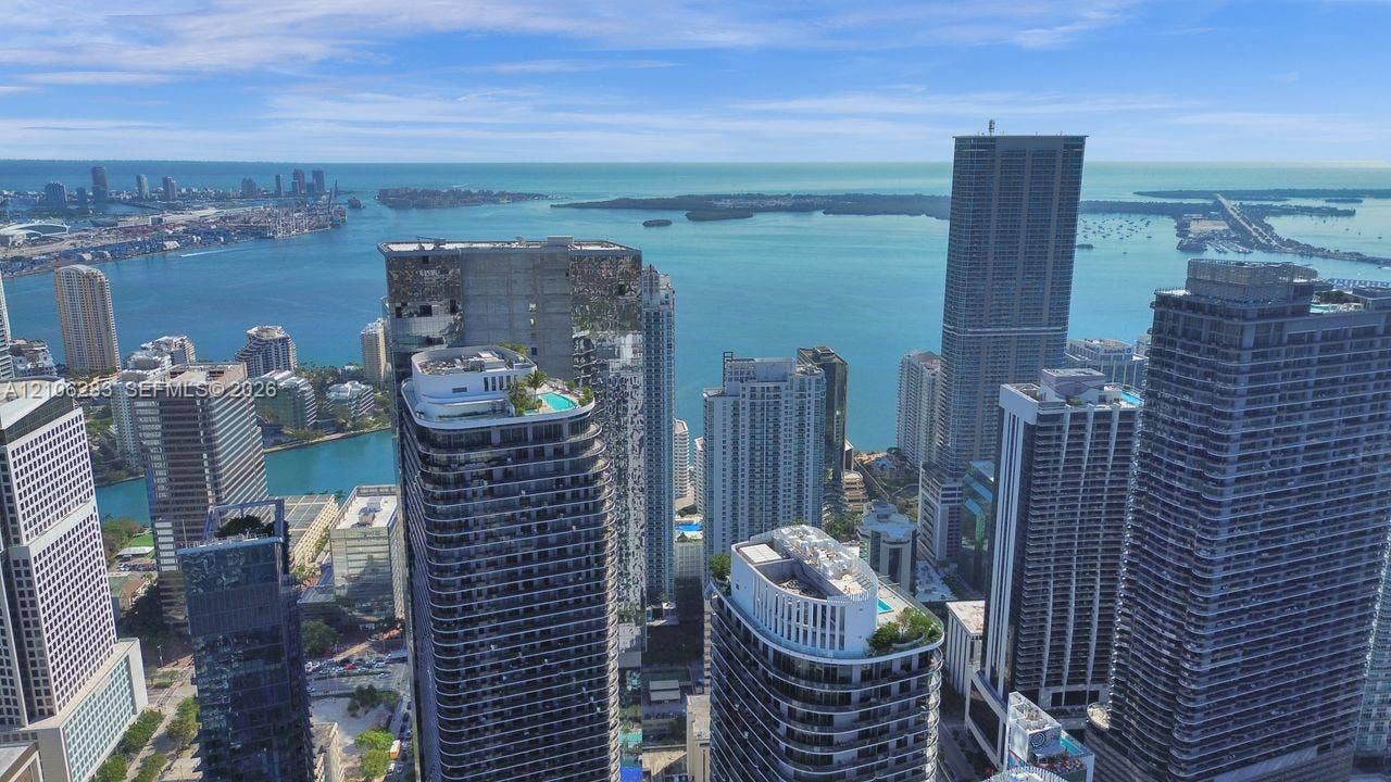 801 S Miami Avenue, #1801, Miami, FL 33130 High-rise aerial perspective featuring an expansive urban skyline and prominent waterfront access