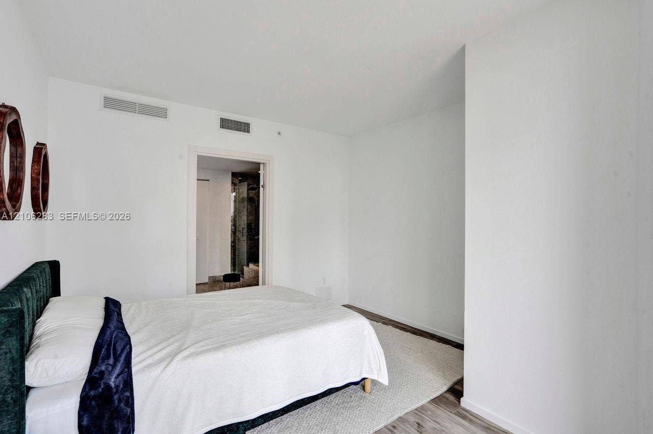 801 S Miami Avenue, #1801, Miami, FL 33130 Room featuring white walls and wood-finish flooring