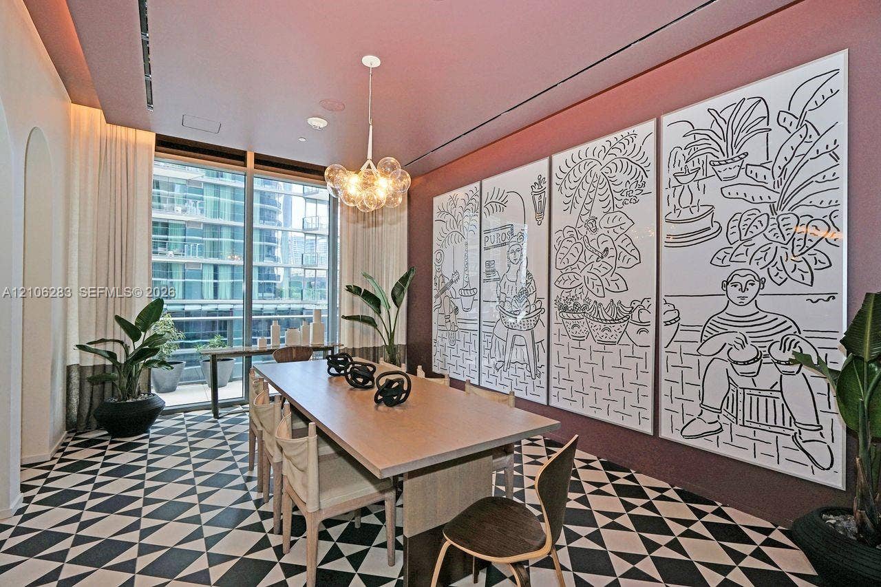 801 S Miami Avenue, #1801, Miami, FL 33130 Geometric patterned tile flooring, floor-to-ceiling glass windows, recessed ceiling lighting, and a multi-globe pendant light fixture