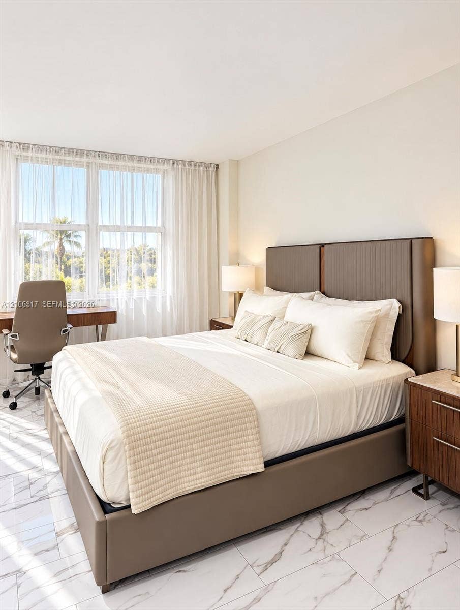 Polished stone-look tile flooring and expansive double-pane windows