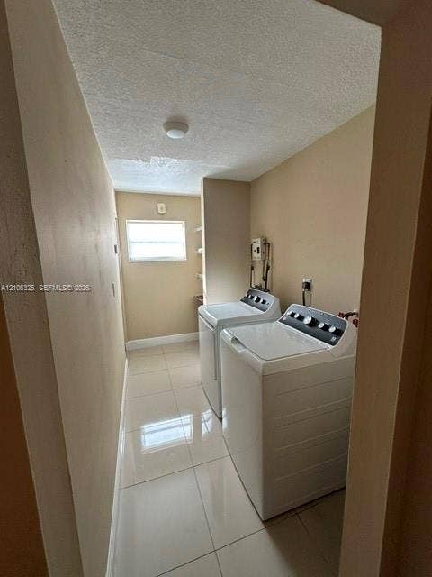 220 NW 87th Avenue, #K212, Miami, Miami, FL 33172 Utility area featuring large-format ceramic tile flooring, a window, and wall-mounted shelving