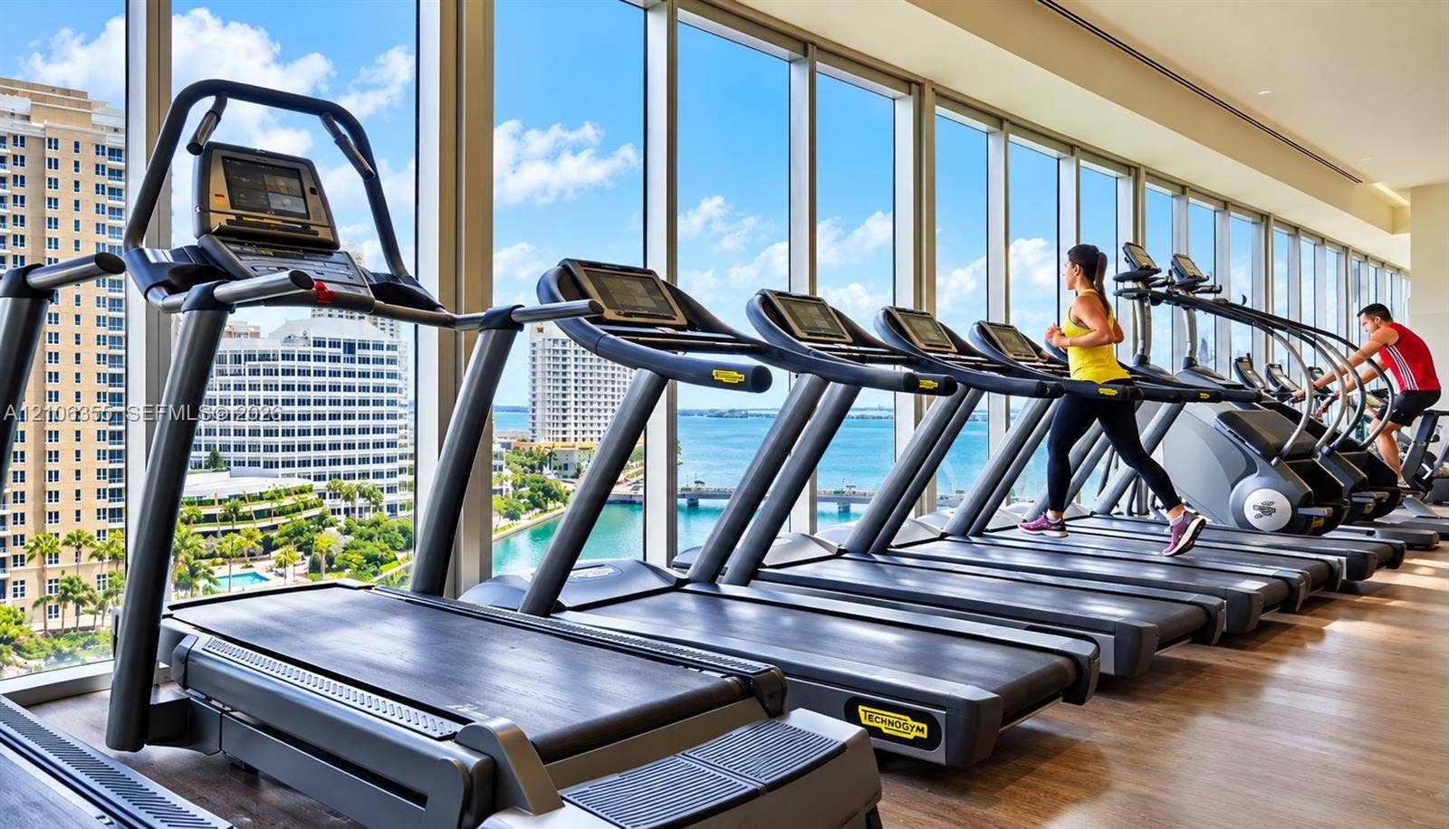 495 Brickell Avenue, #1906, Miami, Miami, FL 33131 Fitness center featuring floor-to-ceiling windows and wood-finish flooring