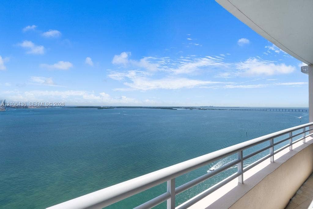 808 Brickell Key Drive, #2102, Miami, Miami, FL 33131 Private balcony featuring white metal railings and expansive water scenery