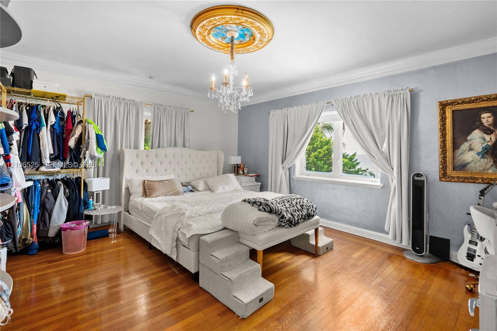 4760 N Bay Road, Miami Beach, FL 33140 Hardwood flooring, decorative ceiling medallion, and crystal chandelier fixture