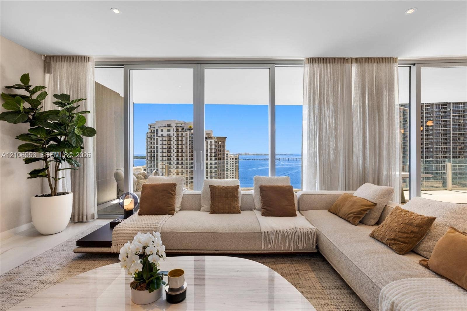 300 Biscayne Boulevard Way, #3002E, Miami, FL 33131 Floor-to-ceiling glass windows, recessed lighting, and neutral wall tones