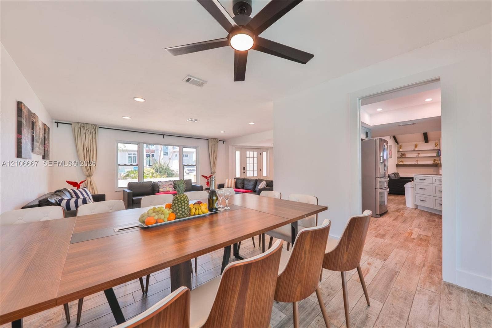 209 Bayshore Drive, Cape Coral, FL 33904 Open-concept interior featuring wood-finish flooring, recessed lighting, and a modern ceiling fan