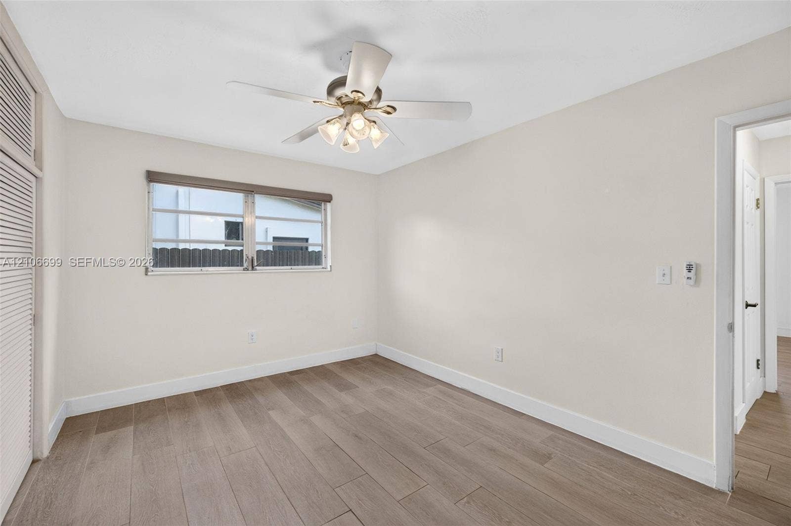 9121 SW 54th Place, Cooper City, FL 33328 Guest bedroom w/ new plank wood look tile