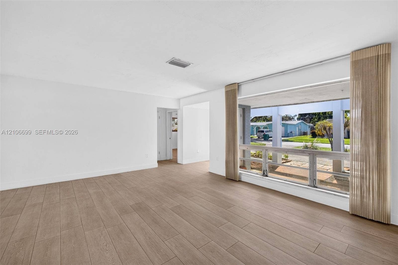 9121 SW 54th Place, Cooper City, FL 33328 Family room w/ new plank wood look tile