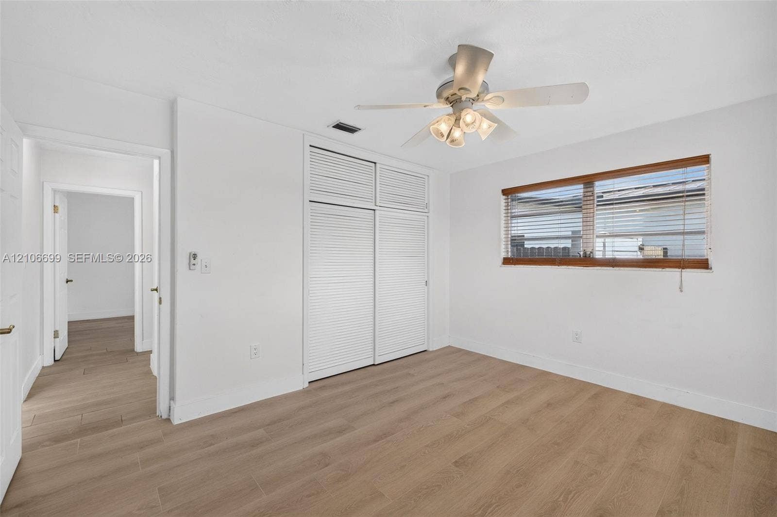 9121 SW 54th Place, Cooper City, FL 33328 Guest bedroom w/ new plank wood look tile