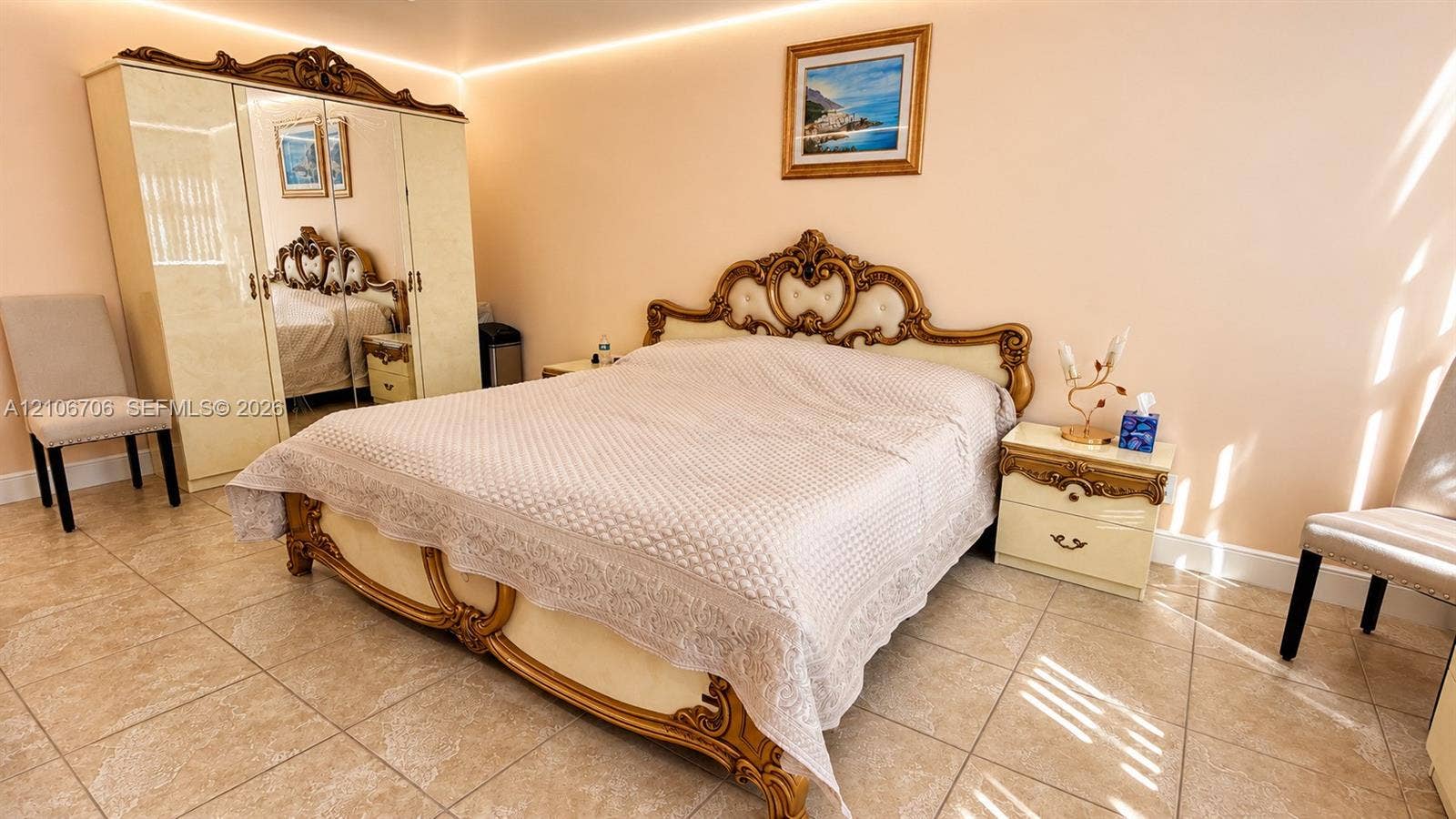 Tile flooring and recessed perimeter ceiling lighting