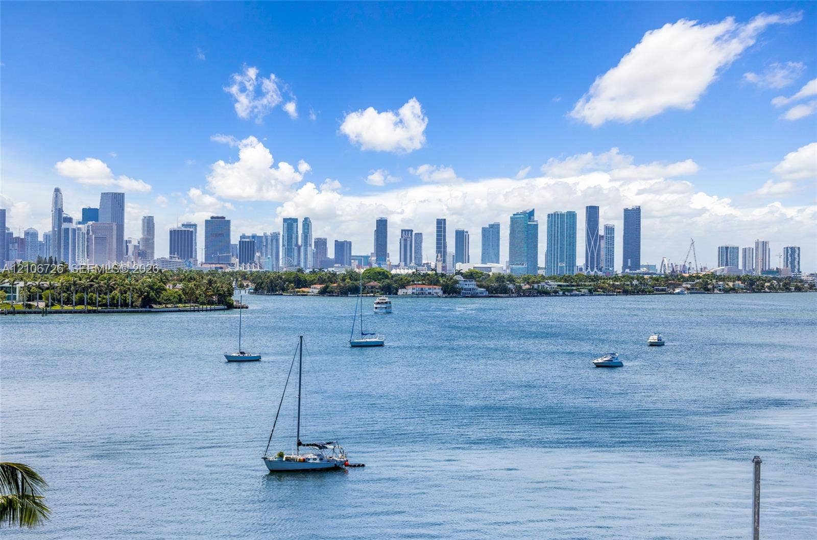 1200 West Avenue, #606, Miami Beach, Miami Beach, FL 33139 Waterfront perspective featuring deep-water bay, nautical activity, and expansive metropolitan skyline