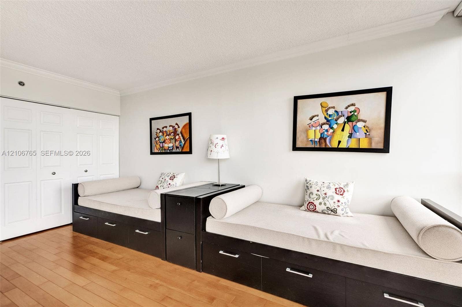 3598 Yacht Club Drive, #901, Aventura, FL 33180 Large second bedroom, white paneled double-door closet.