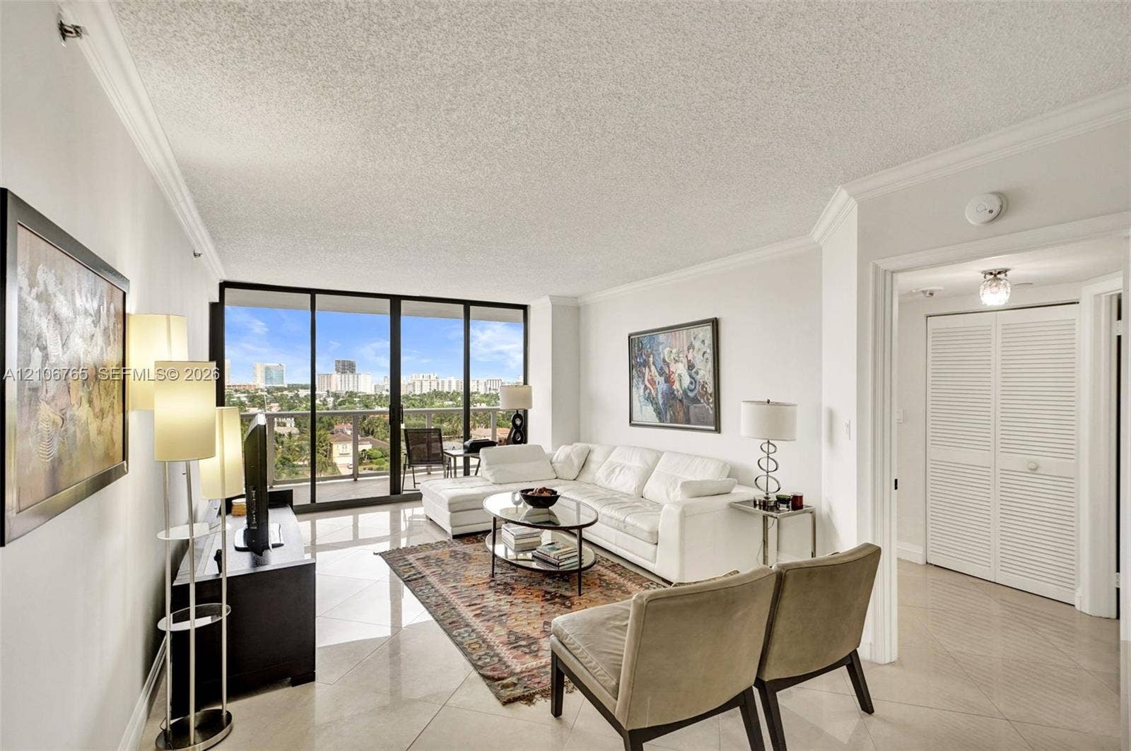 3598 Yacht Club Drive, #901, Aventura, FL 33180 Floor-to-ceiling glass doors opening to a balcony.