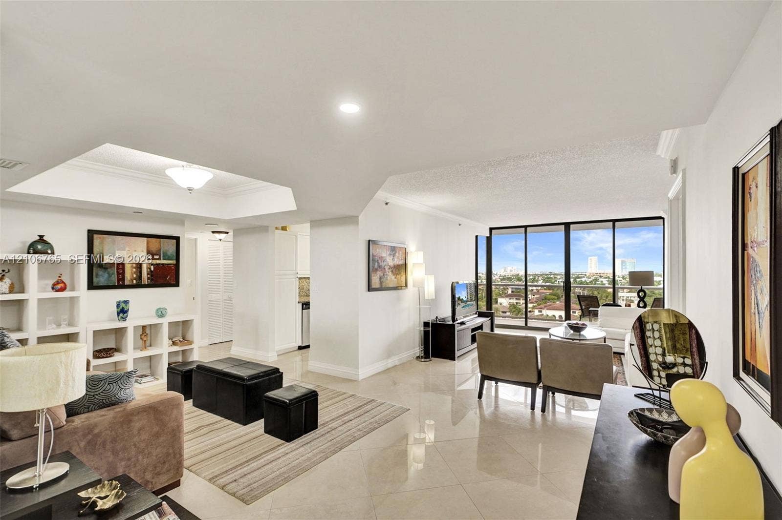 3598 Yacht Club Drive, #901, Aventura, FL 33180 Living room and dining room that can be used as a den.