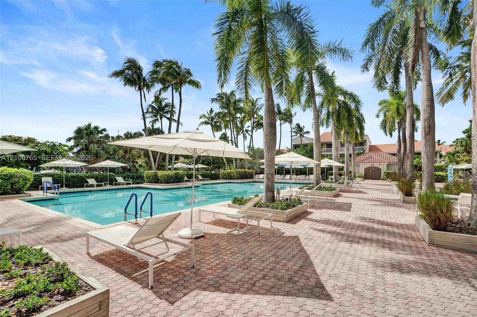 3598 Yacht Club Drive, #901, Aventura, FL 33180 Second pool, palm trees, raised landscape planters.