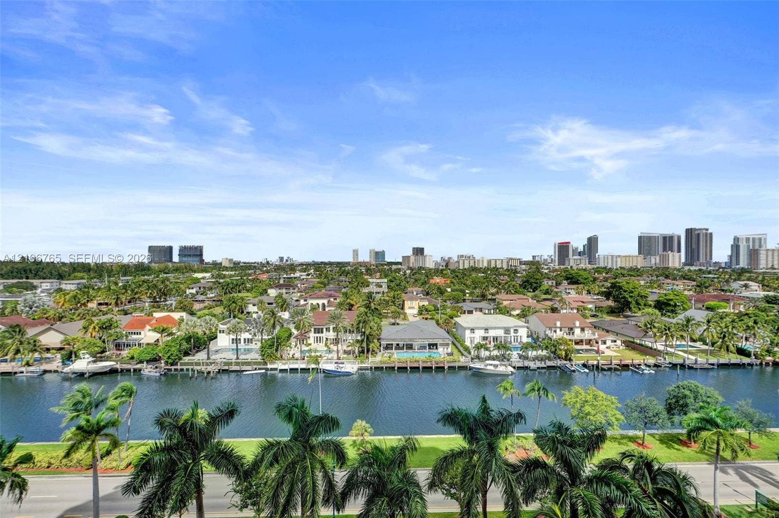 3598 Yacht Club Drive, #901, Aventura, FL 33180 Totally unobstructed views from every room. Canal, private boat slips, tropical landscaping, and a panoramic urban skyline backdrop
