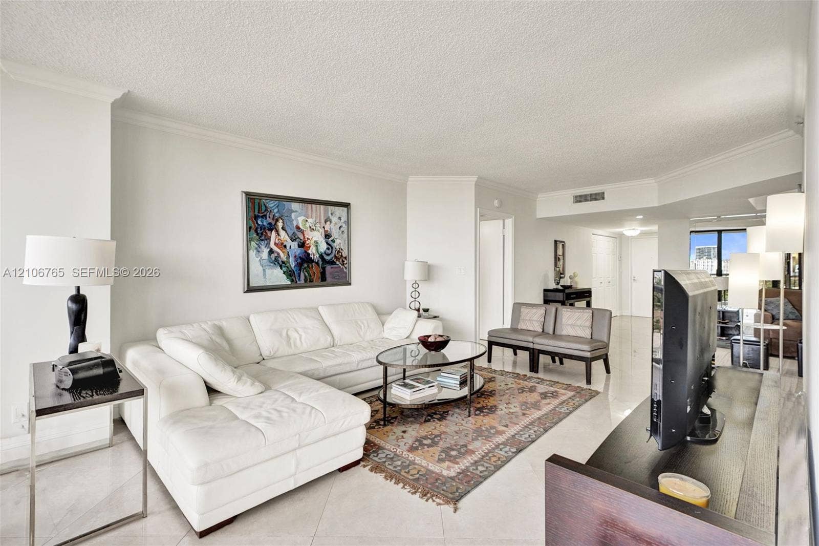 3598 Yacht Club Drive, #901, Aventura, FL 33180 Open-concept living space, ceramic tiles, neutral wall tones.