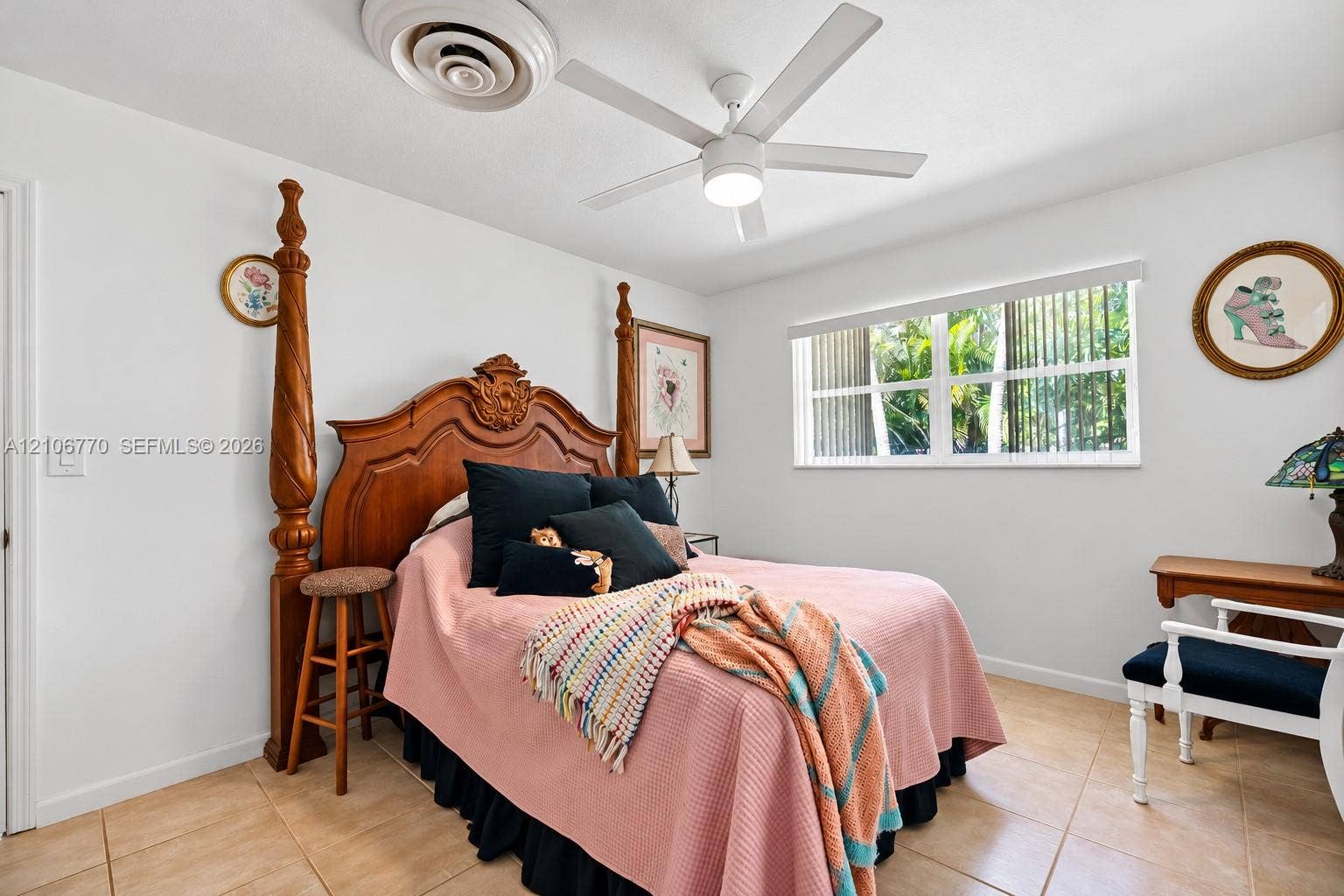 5701 SW 1st Street, Plantation, FL 33317 Neutral-toned tile flooring, ceiling fan with integrated lighting, and horizontal window blinds