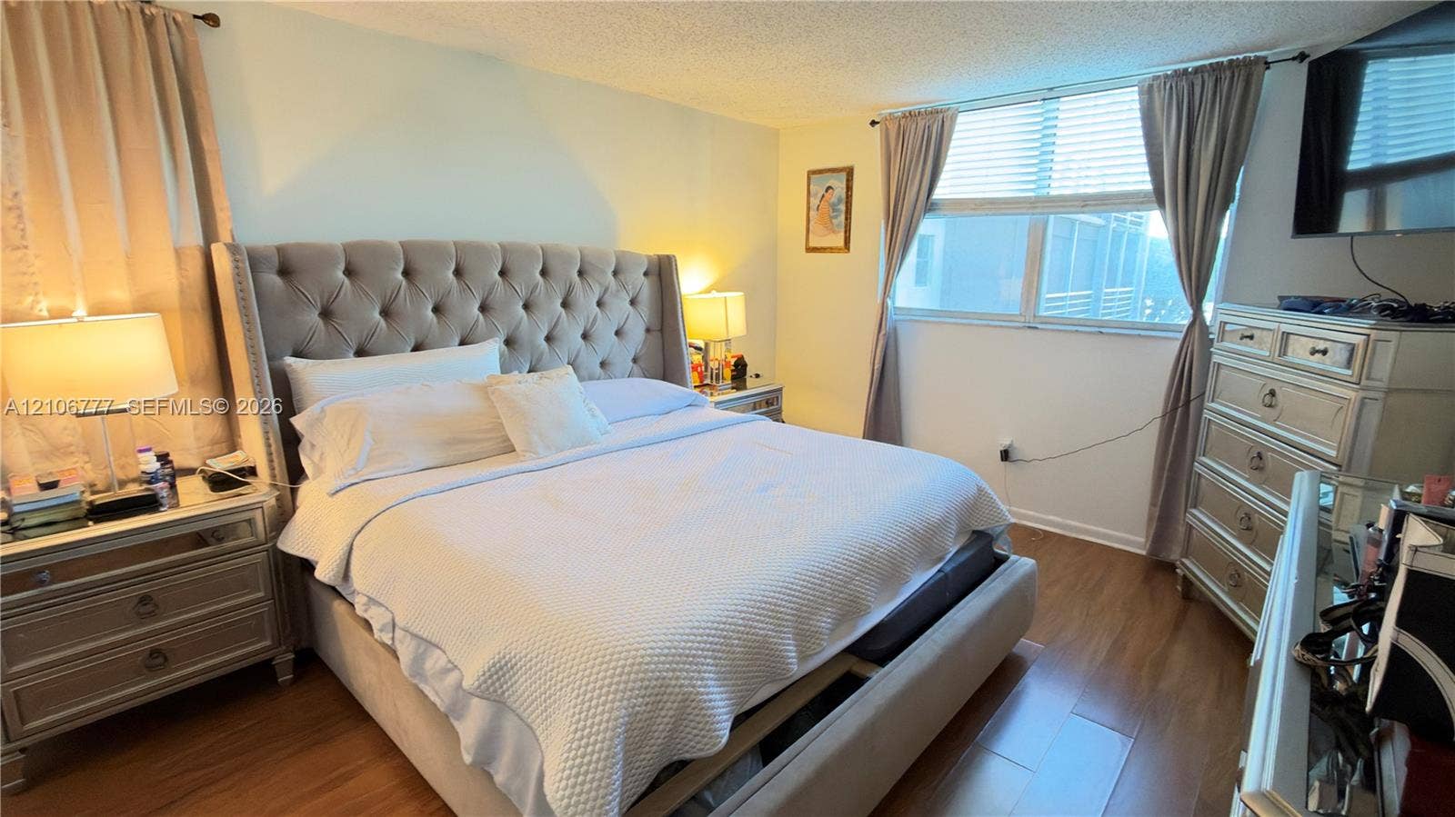 1810 SW 81st Avenue, #2200, North Lauderdale, North Lauderdale, FL 33068 Bedroom featuring large-format horizontal windows with integrated blinds and wood-finish flooring