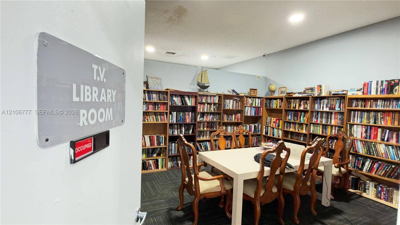 1810 SW 81st Avenue, #2200, North Lauderdale, North Lauderdale, FL 33068 Built-in floor-to-ceiling wooden shelving and recessed ceiling lighting