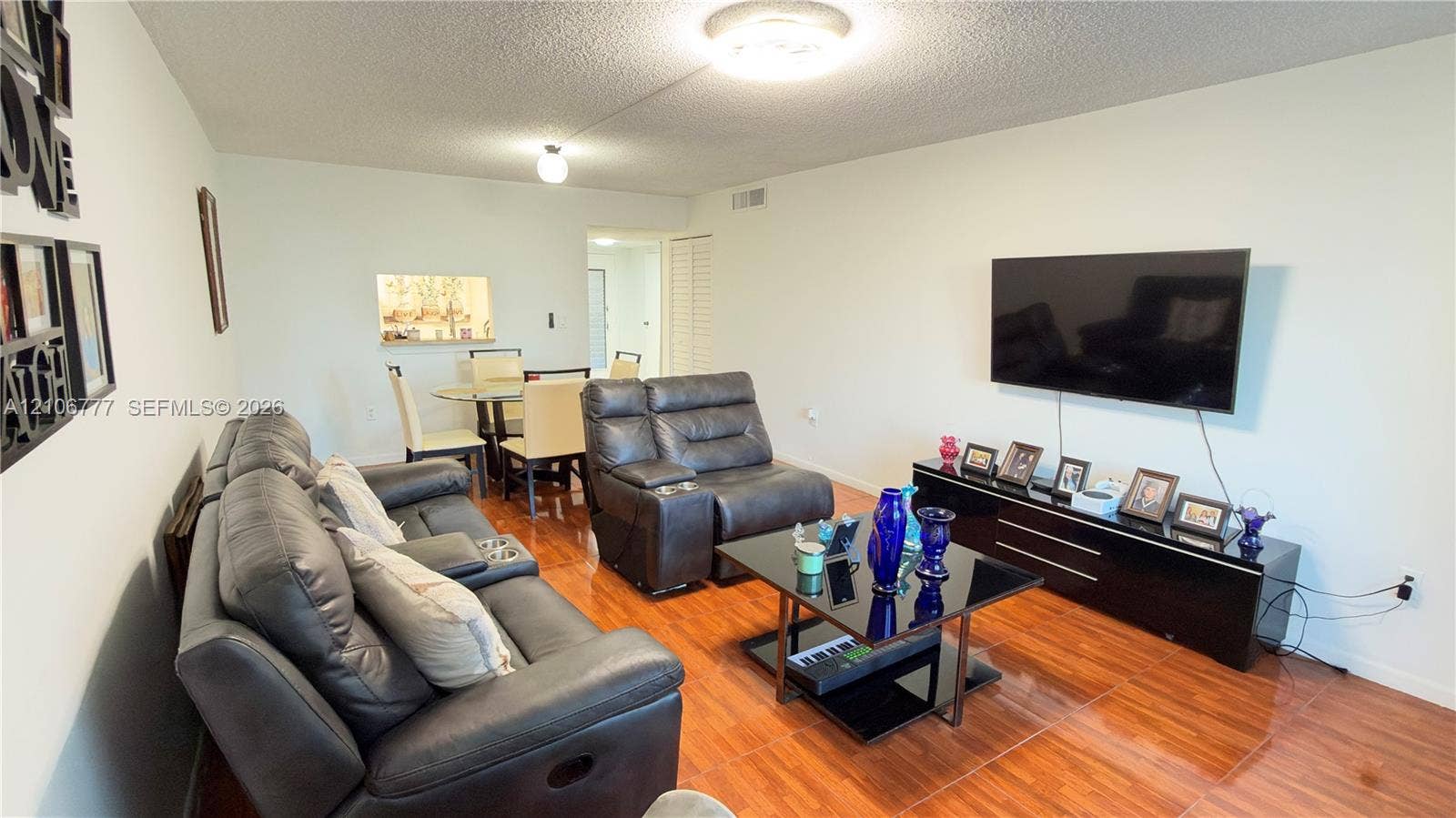 1810 SW 81st Avenue, #2200, North Lauderdale, North Lauderdale, FL 33068 Living area featuring wood-finish flooring, neutral wall tones, and recessed ceiling lighting