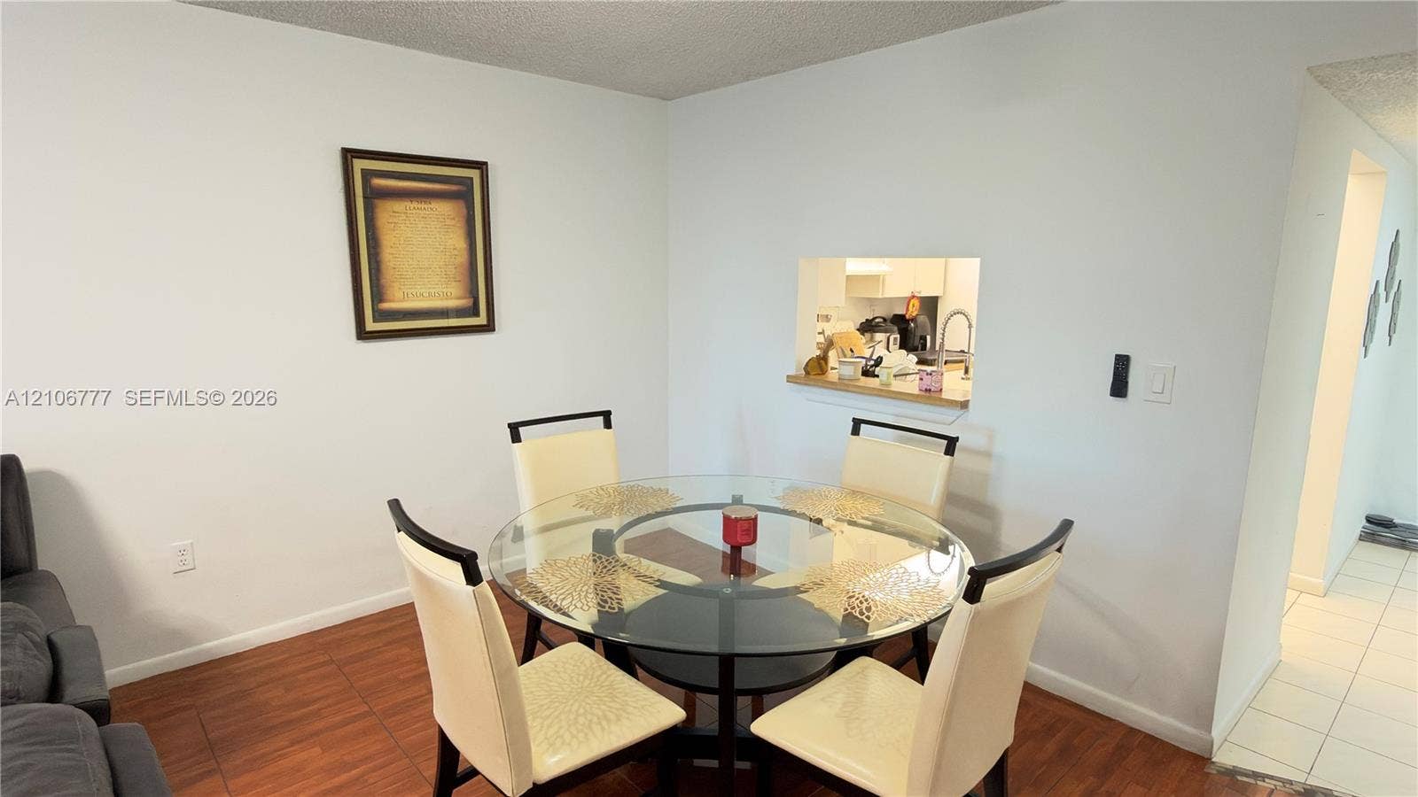 1810 SW 81st Avenue, #2200, North Lauderdale, North Lauderdale, FL 33068 Wood-finish flooring and a kitchen pass-through window with a ledge