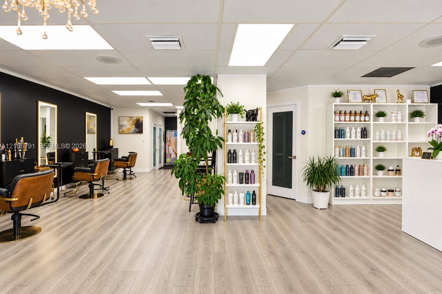 1684 SE 10th Avenue, Fort Lauderdale, Fort Lauderdale, FL 33316 Commercial interior space featuring wood-finish flooring, recessed lighting, built-in open shelving, and a bold high-contrast accent wall