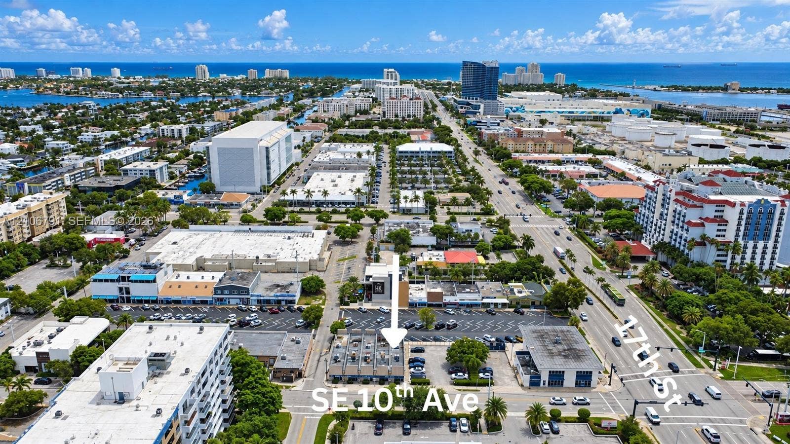 1684 SE 10th Avenue, Fort Lauderdale, Fort Lauderdale, FL 33316 Aerial perspective of urban property featuring proximity to major thoroughfares, surface parking, and coastal surroundings
