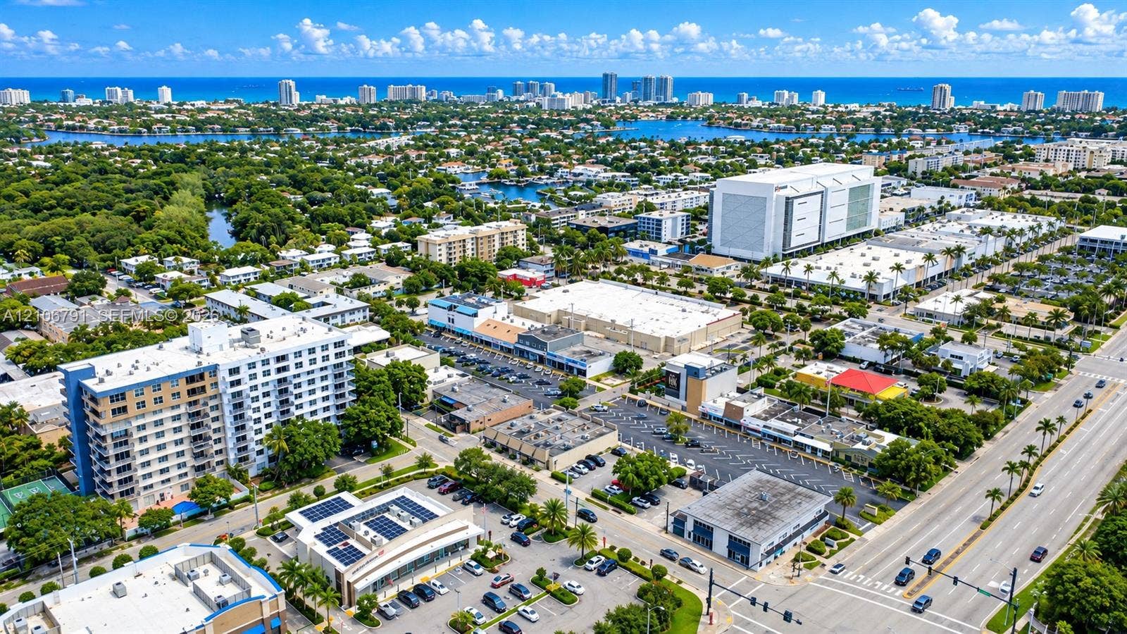 1684 SE 10th Avenue, Fort Lauderdale, Fort Lauderdale, FL 33316 Aerial perspective featuring coastal proximity, urban development, dense canopy coverage, and established thoroughfares