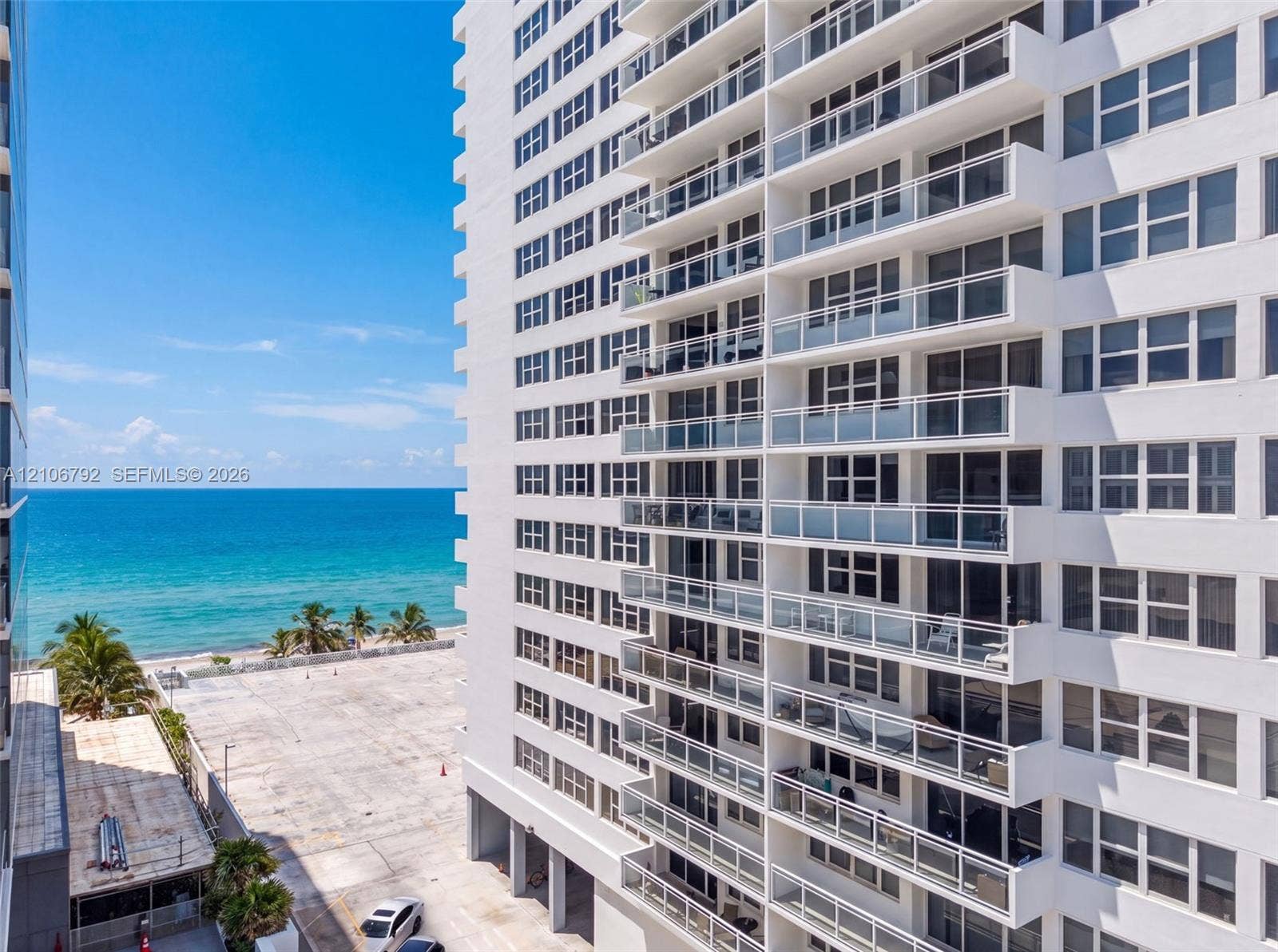 2030 S Ocean Drive, #723, Hallandale Beach, FL 33009 High-rise exterior featuring private balconies with glass railings and direct oceanfront exposure