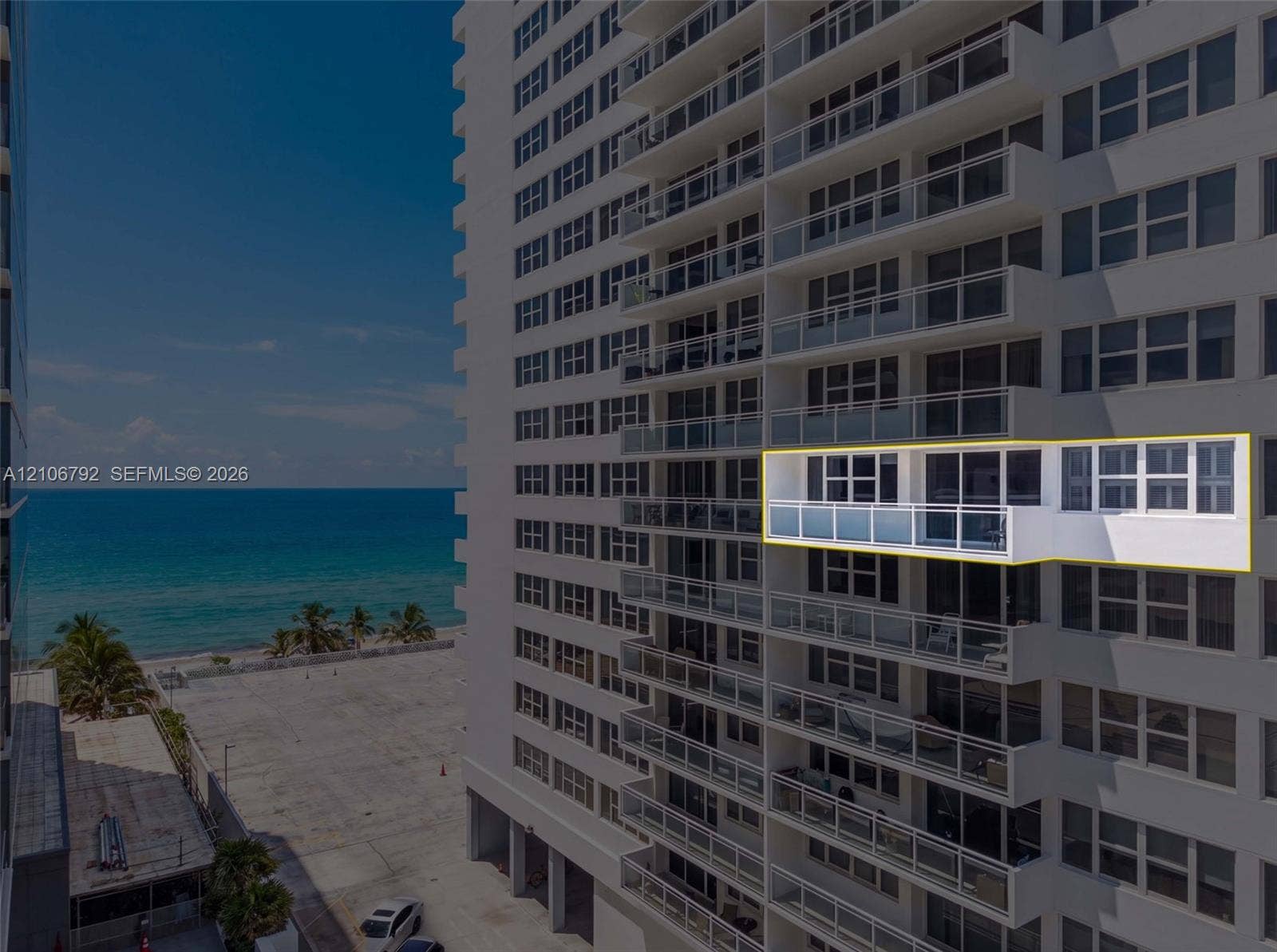 2030 S Ocean Drive, #723, Hallandale Beach, FL 33009 High-rise building exterior featuring glass balcony railings and sliding floor-to-ceiling windows