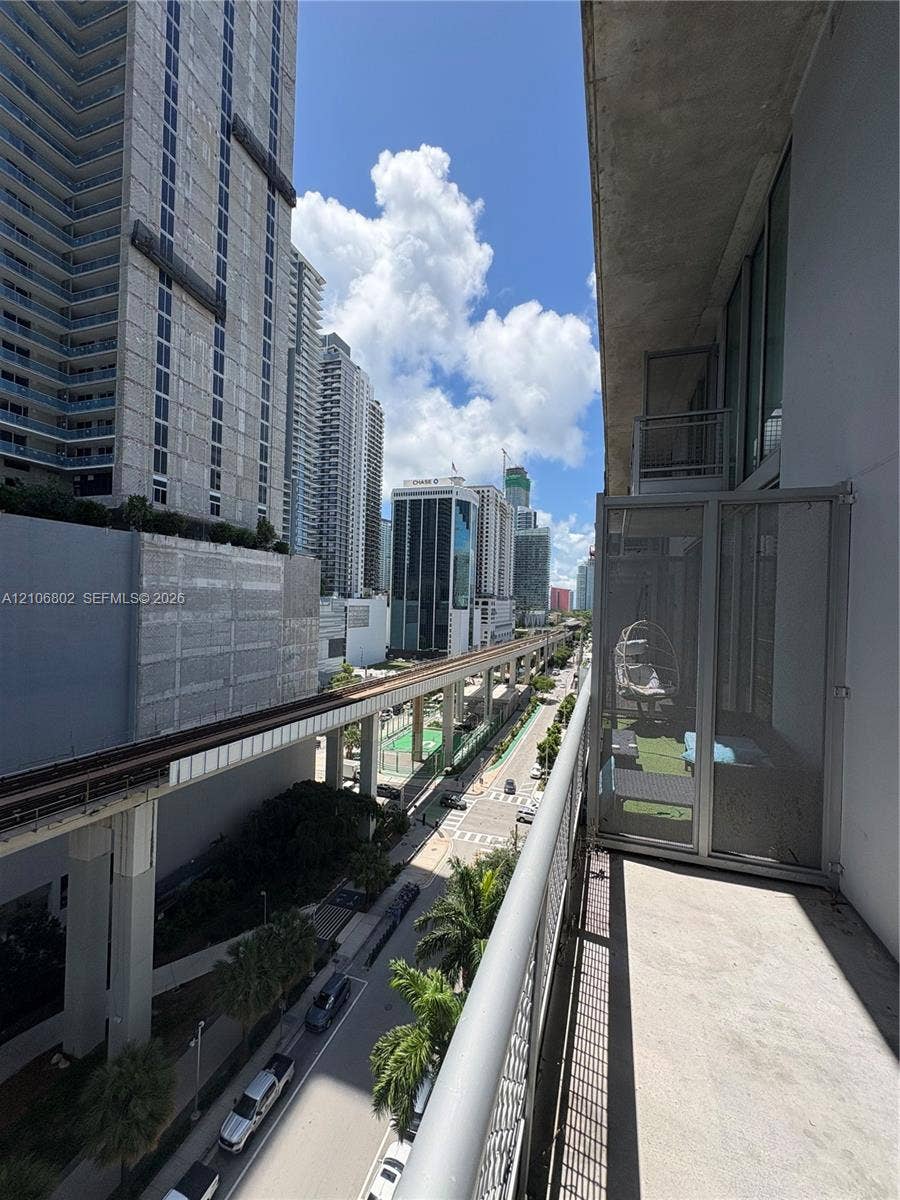 690 SW 1st Court, #1212, Miami, FL 33130 Private balcony featuring concrete flooring and metal railings
